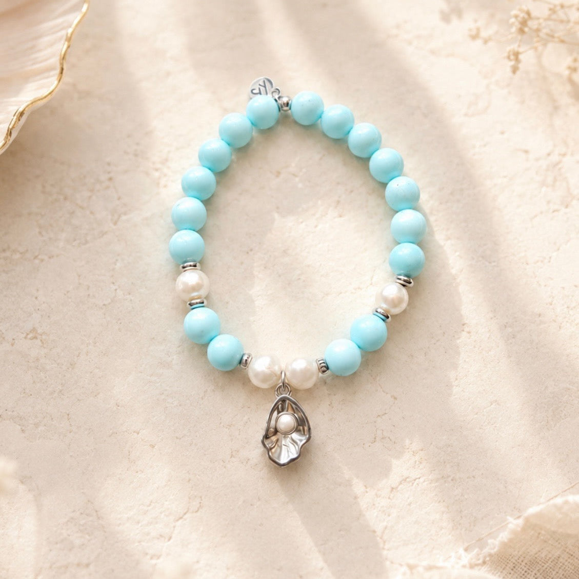 Limited Edition Exclusive Sterling Silver Oyster Charm with Blue Turquoise Gemstone Bracelet